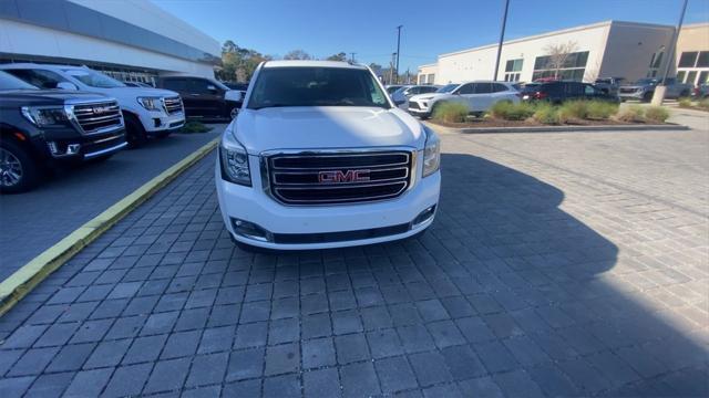 used 2015 GMC Yukon car, priced at $23,999