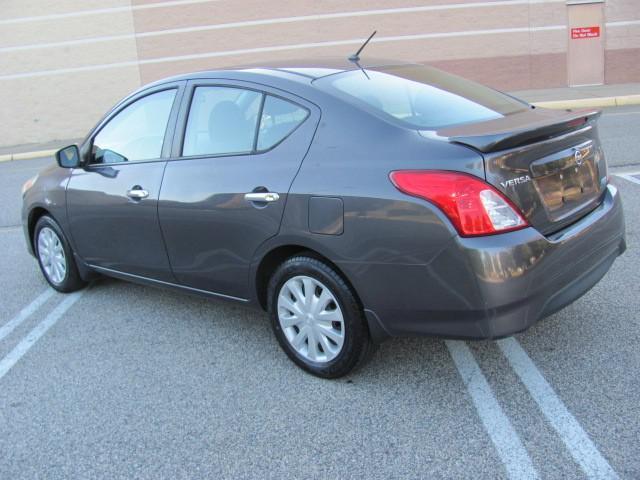 used 2015 Nissan Versa car, priced at $5,999