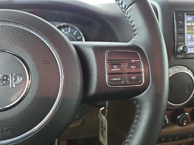 used 2016 Jeep Wrangler Unlimited car, priced at $13,988