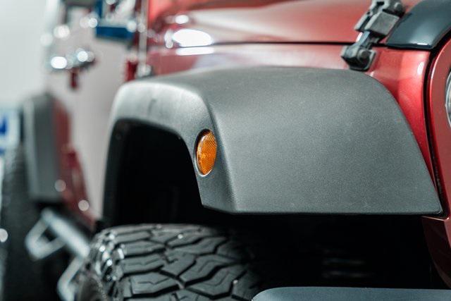 used 2012 Jeep Wrangler Unlimited car, priced at $17,985