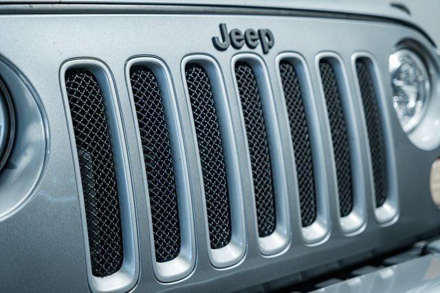 used 2018 Jeep Wrangler JK Unlimited car, priced at $23,375