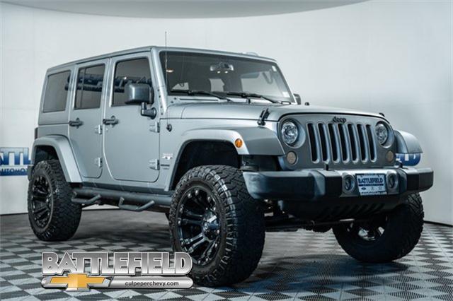 used 2018 Jeep Wrangler JK Unlimited car, priced at $23,375