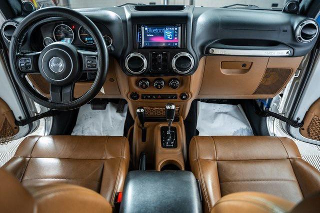 used 2012 Jeep Wrangler Unlimited car, priced at $12,962