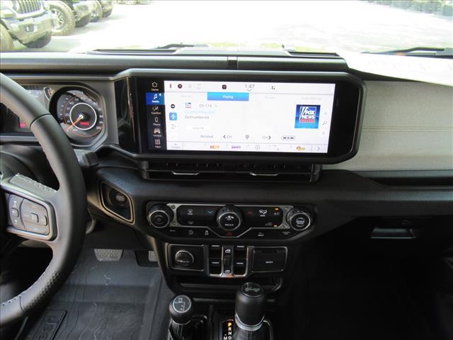 used 2025 Jeep Wrangler car, priced at $36,700