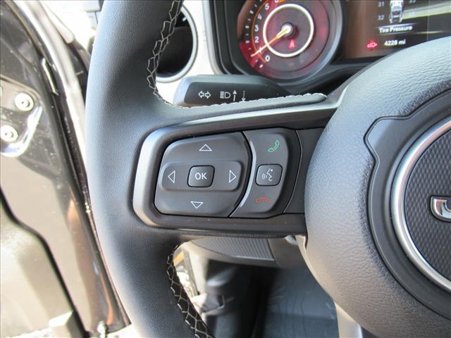 used 2025 Jeep Wrangler car, priced at $36,700