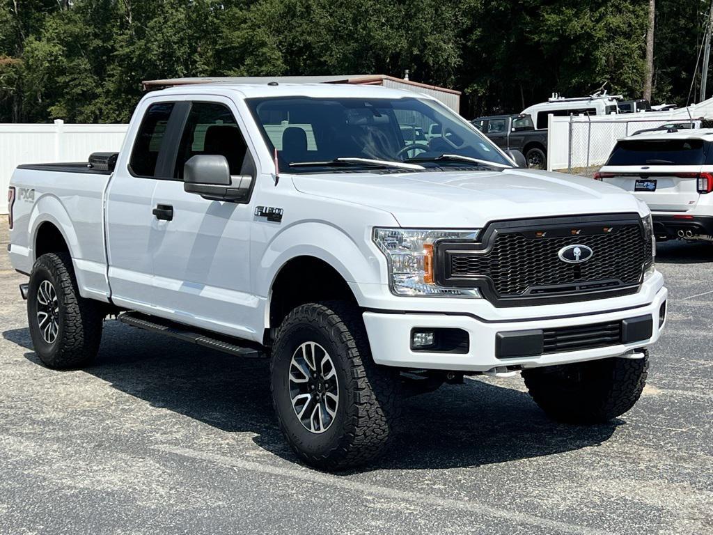used 2019 Ford F-150 car, priced at $26,328