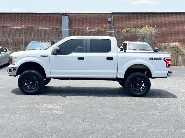 used 2018 Ford F-150 car, priced at $23,119