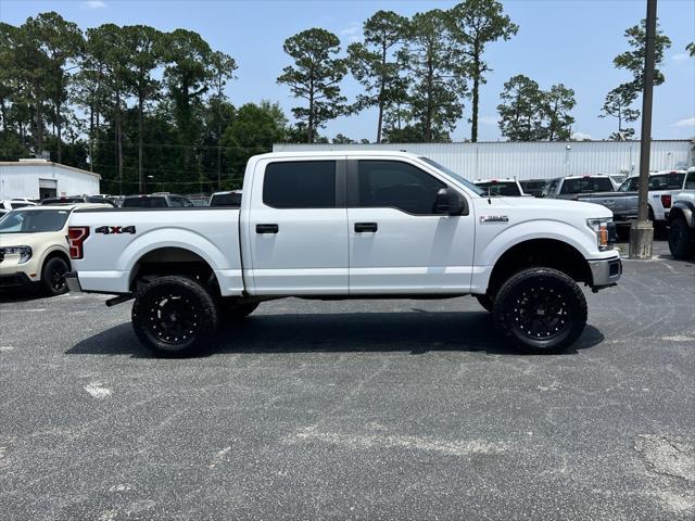 used 2018 Ford F-150 car, priced at $23,119