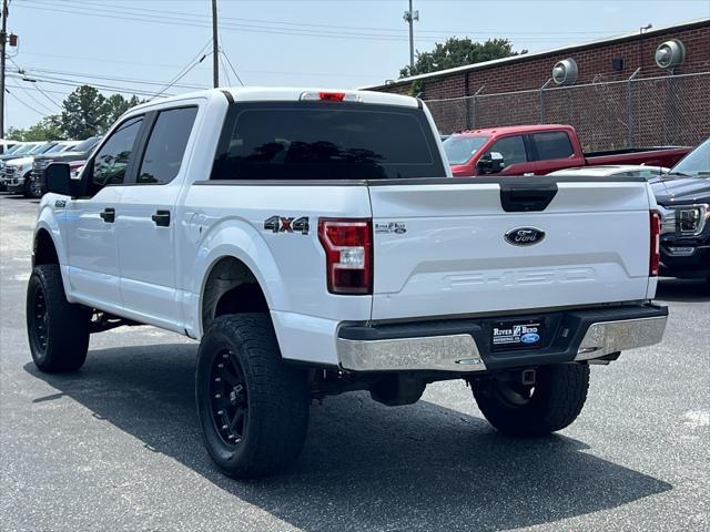 used 2018 Ford F-150 car, priced at $23,119