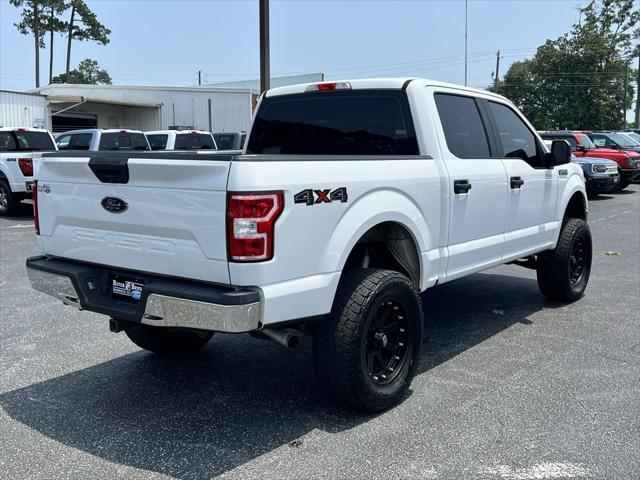 used 2018 Ford F-150 car, priced at $23,119