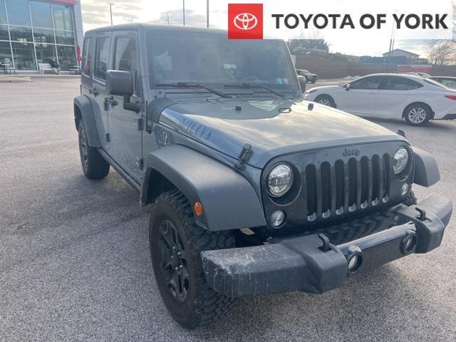 used 2014 Jeep Wrangler Unlimited car, priced at $19,779