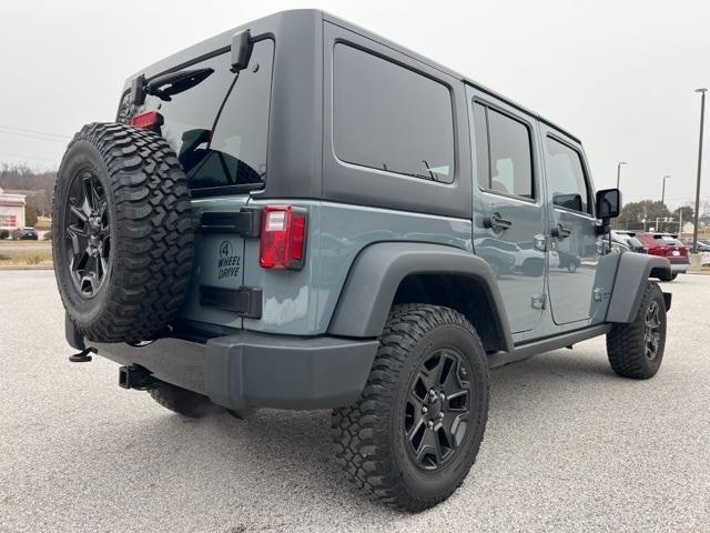 used 2014 Jeep Wrangler Unlimited car, priced at $19,779