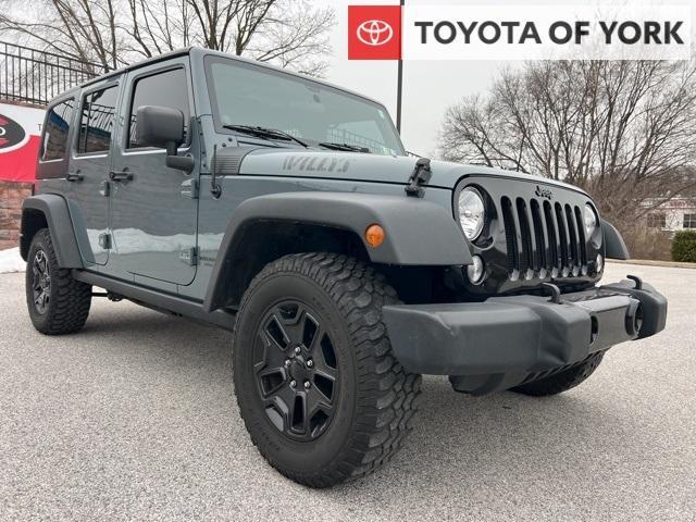 used 2014 Jeep Wrangler Unlimited car, priced at $19,779