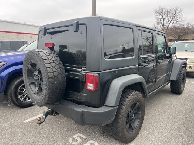 used 2011 Jeep Wrangler Unlimited car, priced at $14,890