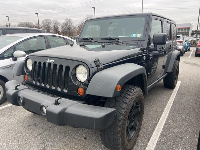 used 2011 Jeep Wrangler Unlimited car, priced at $14,890