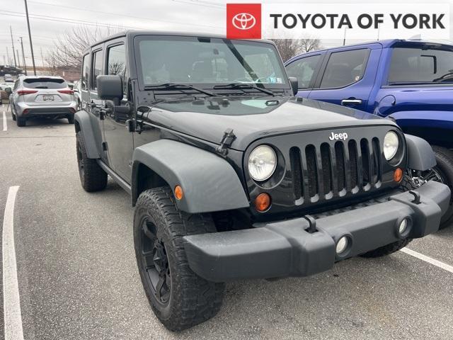 used 2011 Jeep Wrangler Unlimited car, priced at $14,890