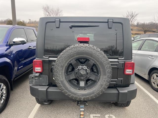 used 2011 Jeep Wrangler Unlimited car, priced at $14,890