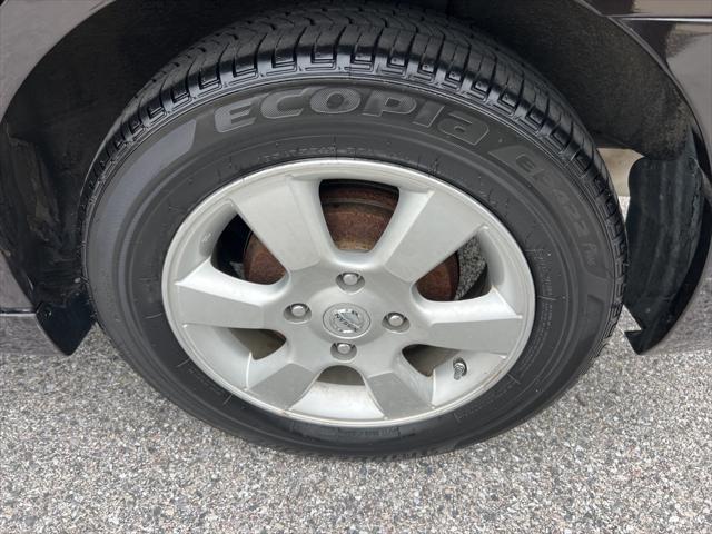 used 2011 Nissan Versa car, priced at $6,900