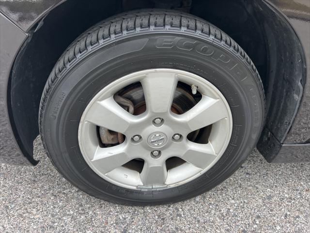 used 2011 Nissan Versa car, priced at $6,900