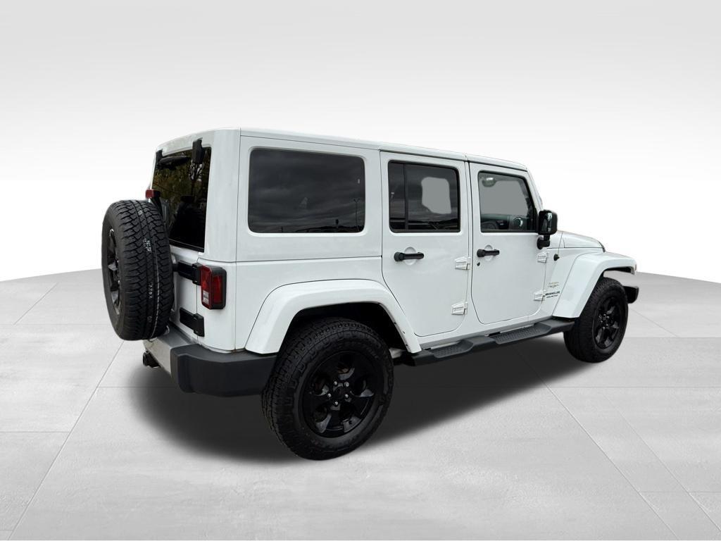 used 2013 Jeep Wrangler Unlimited car, priced at $16,974