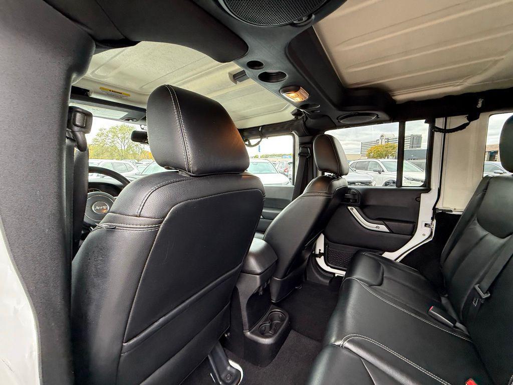 used 2013 Jeep Wrangler Unlimited car, priced at $16,974