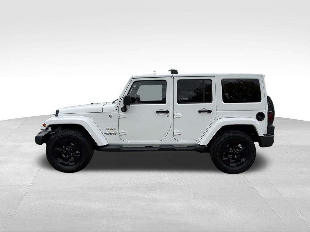 used 2013 Jeep Wrangler Unlimited car, priced at $16,974