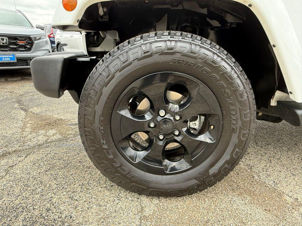 used 2013 Jeep Wrangler Unlimited car, priced at $16,974