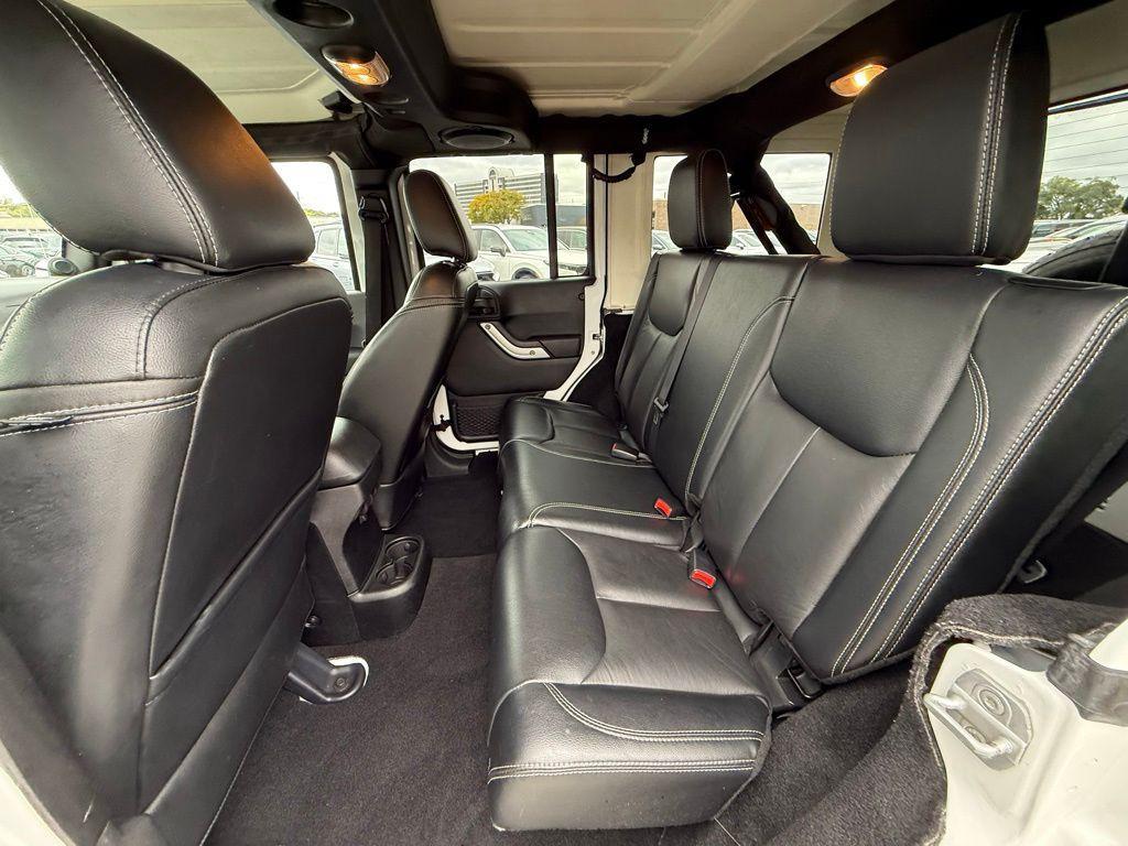used 2013 Jeep Wrangler Unlimited car, priced at $16,974