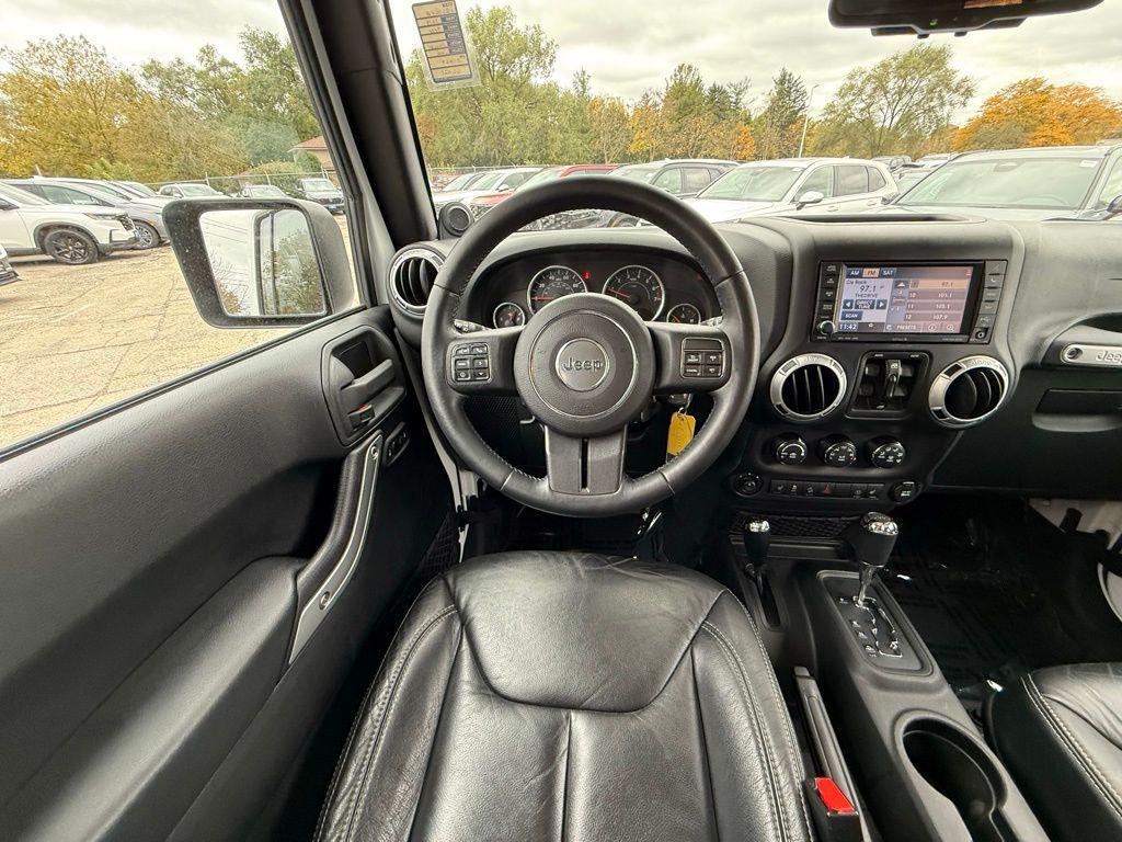 used 2013 Jeep Wrangler Unlimited car, priced at $16,974
