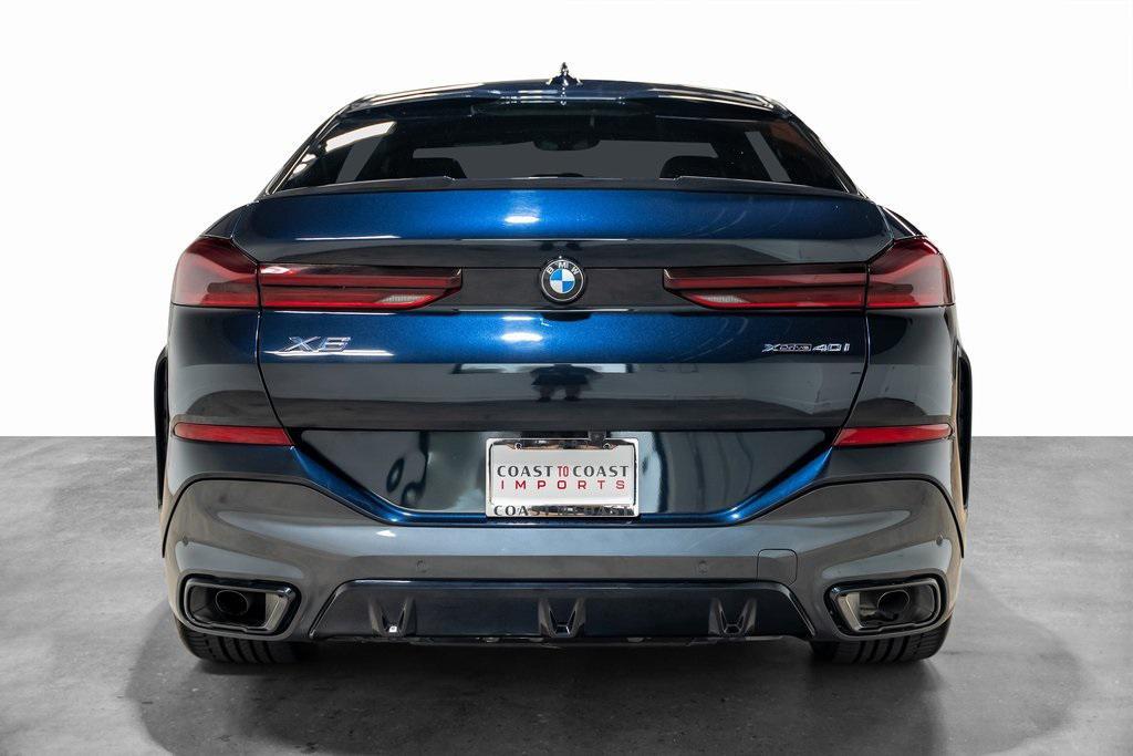 used 2023 BMW X6 car, priced at $55,990