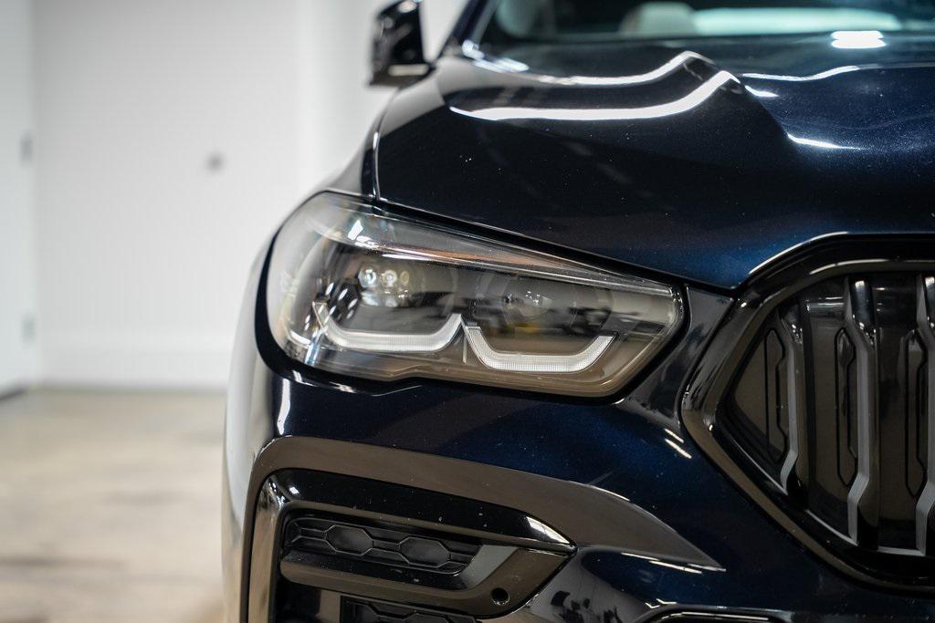 used 2023 BMW X6 car, priced at $55,990