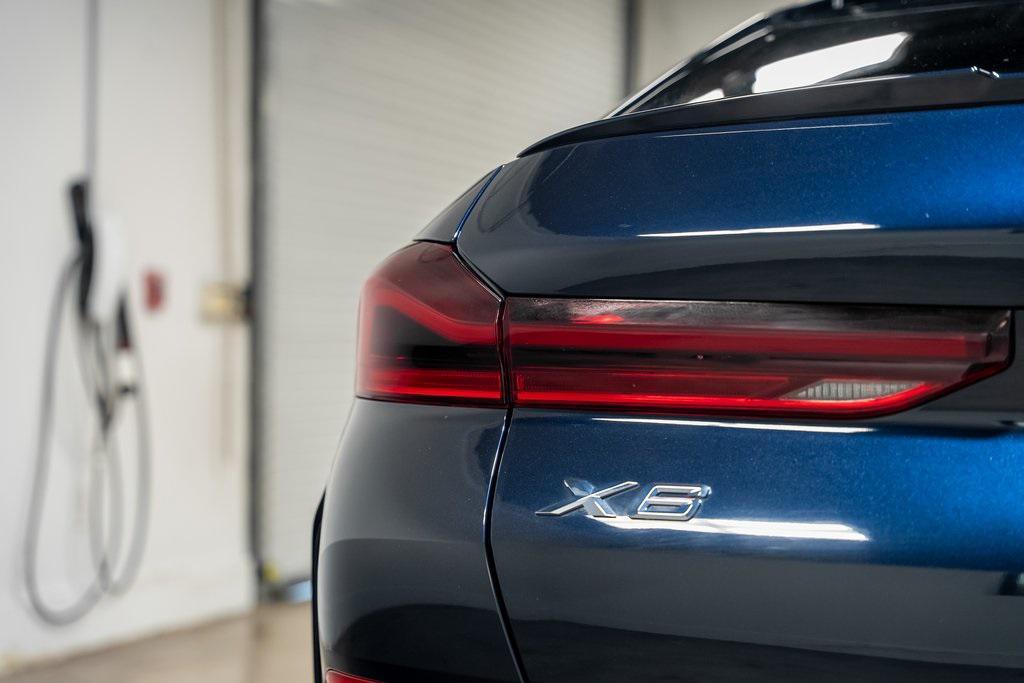 used 2023 BMW X6 car, priced at $55,990