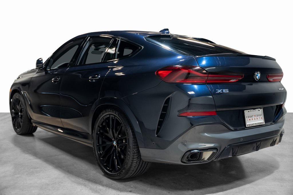used 2023 BMW X6 car, priced at $55,990