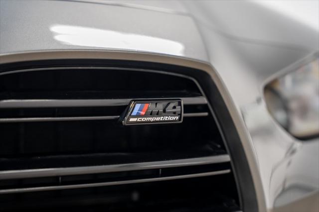 used 2023 BMW M4 car, priced at $75,990