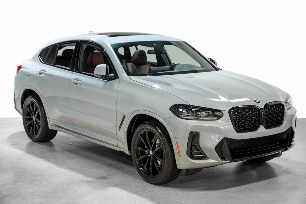 used 2025 BMW X4 car, priced at $54,490