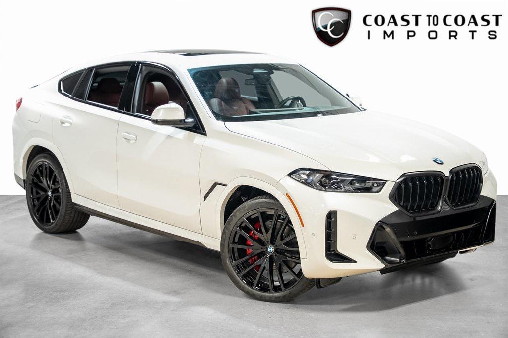 used 2024 BMW X6 car, priced at $71,490