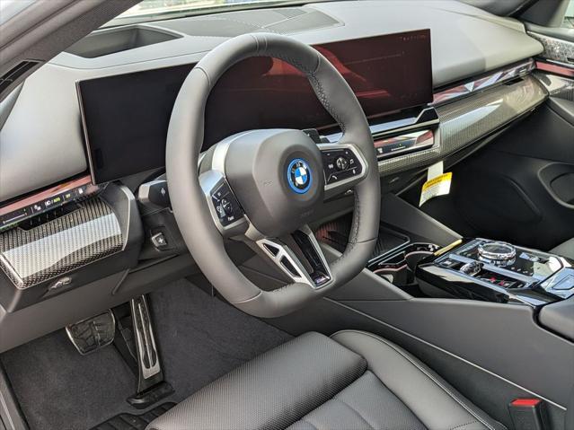 new 2026 BMW 550e car, priced at $85,475