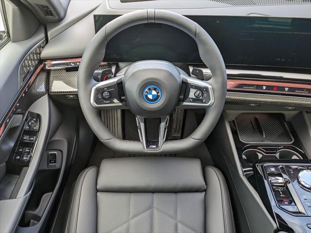 new 2026 BMW 550e car, priced at $85,475