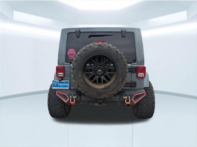 used 2014 Jeep Wrangler Unlimited car, priced at $21,867