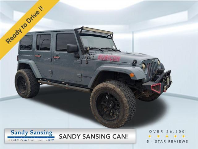 used 2014 Jeep Wrangler Unlimited car, priced at $21,867