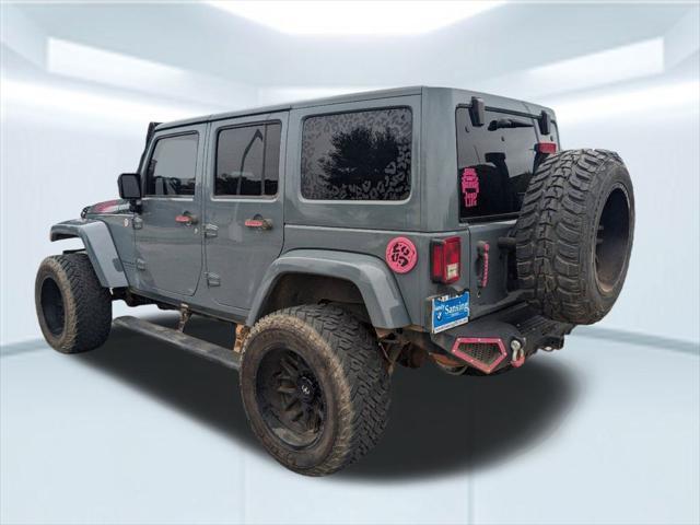 used 2014 Jeep Wrangler Unlimited car, priced at $21,867