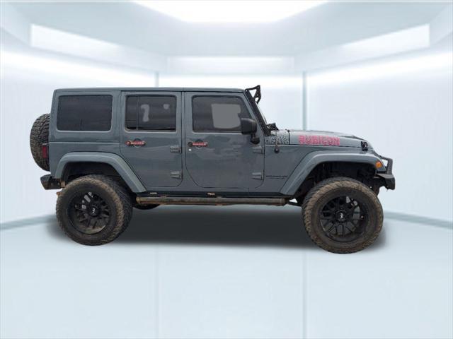 used 2014 Jeep Wrangler Unlimited car, priced at $21,867