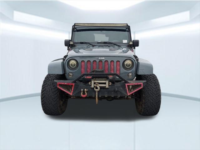 used 2014 Jeep Wrangler Unlimited car, priced at $21,867