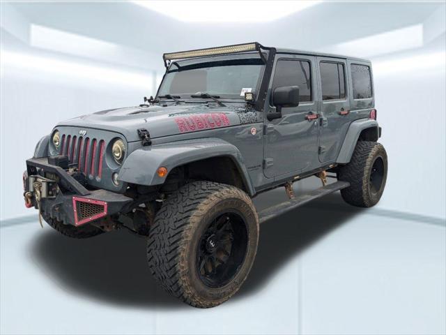 used 2014 Jeep Wrangler Unlimited car, priced at $21,867