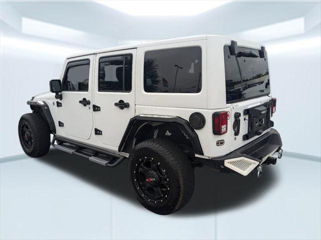 used 2014 Jeep Wrangler Unlimited car, priced at $23,912