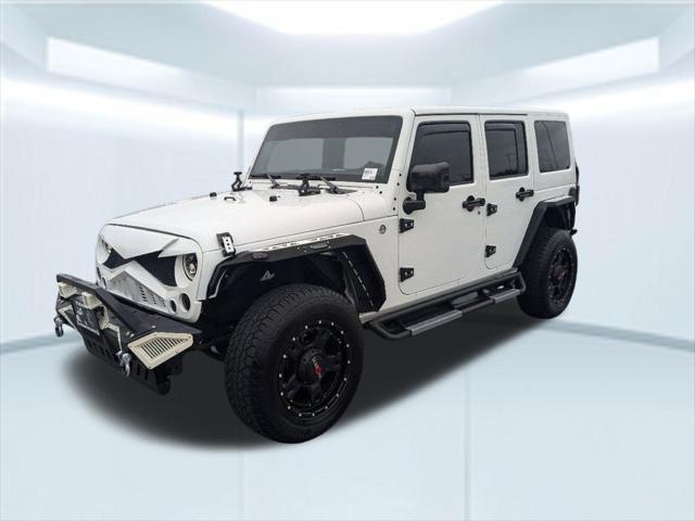 used 2014 Jeep Wrangler Unlimited car, priced at $23,912