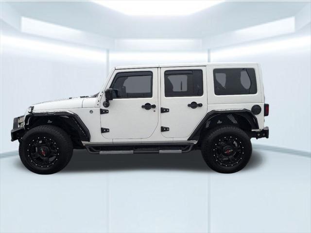 used 2014 Jeep Wrangler Unlimited car, priced at $23,912