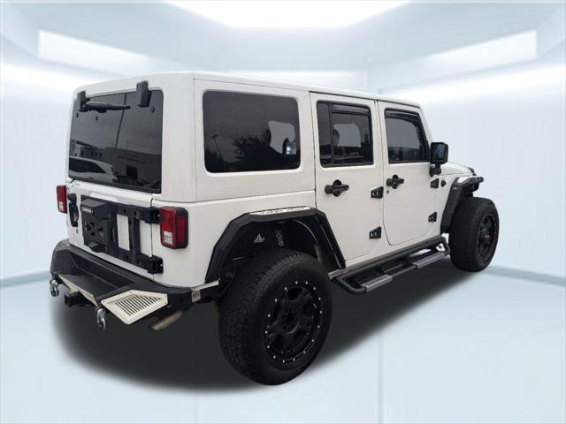 used 2014 Jeep Wrangler Unlimited car, priced at $23,912