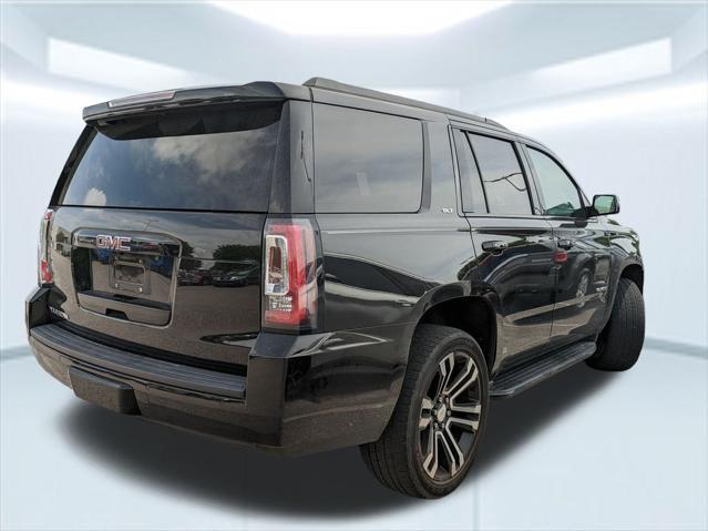 used 2019 GMC Yukon car, priced at $26,228