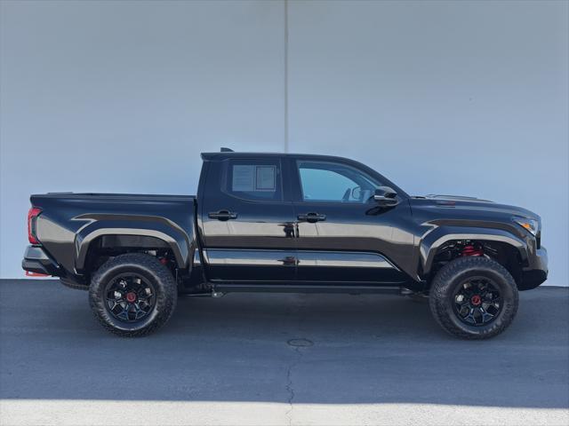 used 2025 Toyota Tacoma car, priced at $66,900